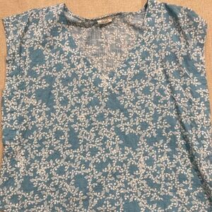 Blue and white floral V-neck top